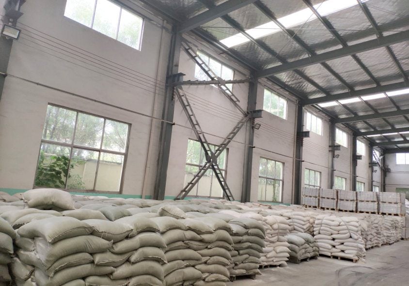 Raw material store: PVC resin and stone powder ahead of the line