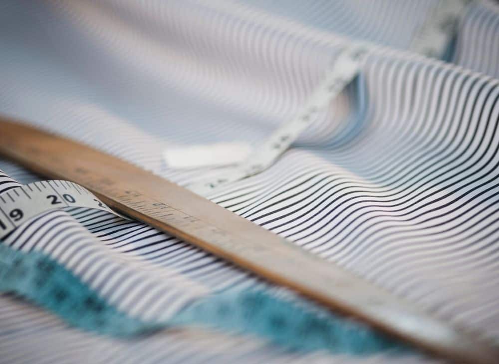 Premium fabric with measuring tape — garments sourcing