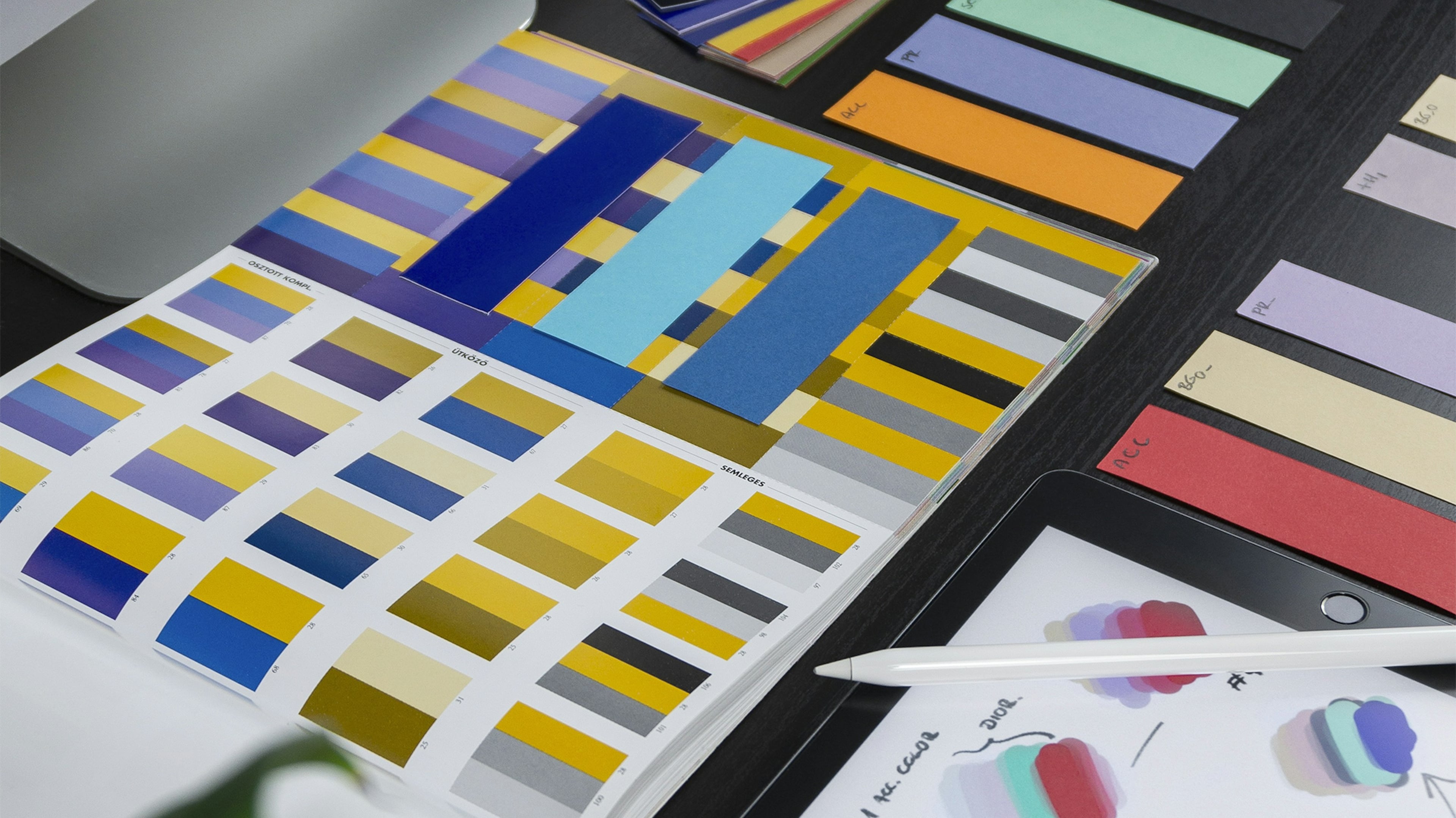 Brand designer workspace - Pantone swatches, color chips, and design tools