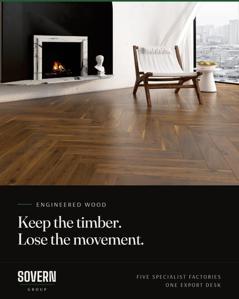 Herringbone walnut floor beside a fireplace. Engineered wood: keep the timber, lose the movement.