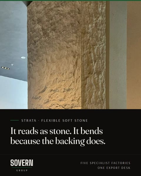 Textured soft stone surfacing on an interior wall. Strata: it reads as stone, and it bends because the backing does.